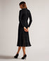 LATINIA-Dresses-This fluted knit dress is a fashion must-have. LATINIA's flattering silhouette, sleek fit and ribbed texture will look amazing with a pair of heels for a night out or worn with chunky boots for a laid back look. It features long sleeves, a crew neckline, a handy zip fastening and slim fit bodice. Midi dress Fluted skirt Ribbed texture Long sleeved Crew neck Zip fastening Slim fit bodice Julia is 5'10" / 1.78m and wears Black in a Ted size 1- Ted Baker Romania